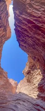Panoramic view of blue sky is seen between the rock formations in Salta, Arg. Stock Photos