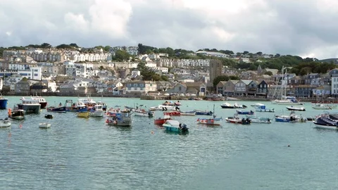 Panoramic view of boats floating on the bay and town in background Stock Footage 111946253