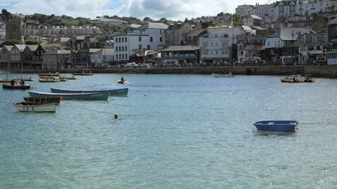 Panoramic view of boats floating on the bay and town in background Stock Footage 112251347