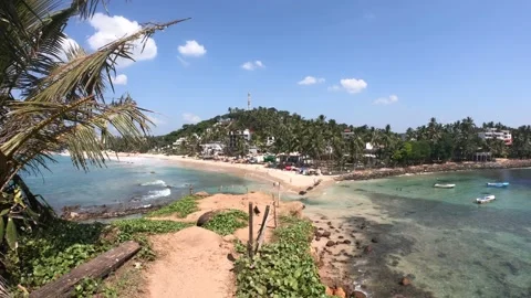 Panoramic view of both areas of Mirissa Beach, Sri Lanka Stock Footage 197055413