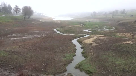 Panoramic view of the bottom of the lake with a lack of water Domasa Slovakia Stock Footage 229729414