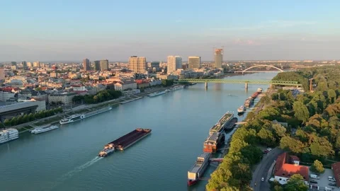 Panoramic view of Bratislava. Motion of bulk carrier at Danube river. Slovakia Stock Footage 205129041