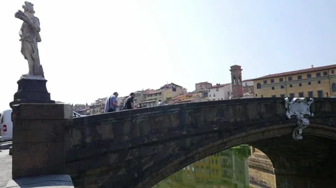Panoramic view of bridge over Arno River in Florence Stock Footage 65365798