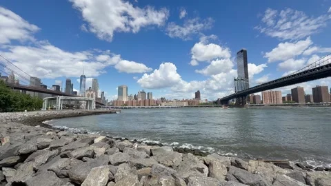 Panoramic view of Brooklyn bridge, East river and Manhattan skyline. New York Stock Footage 337837877