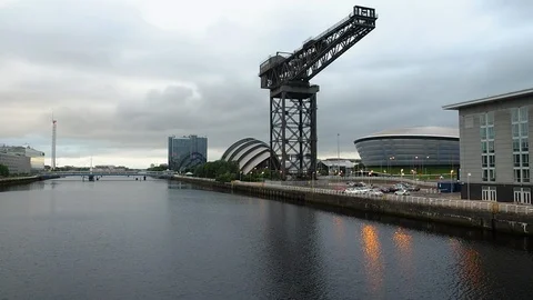Panoramic view of buildings along Clyde River in Glasgow, United Kingdom Stock Footage 87810598