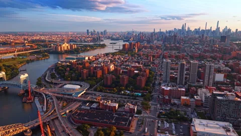 Panoramic view of a bustling city cityscape during late afternoon or sunset. Stock Footage 344603069