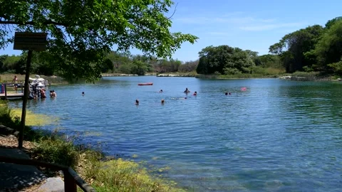 Panoramic View of Caatinga Landscape and tourists relaxing at River Pratinha Stock Footage 165552334