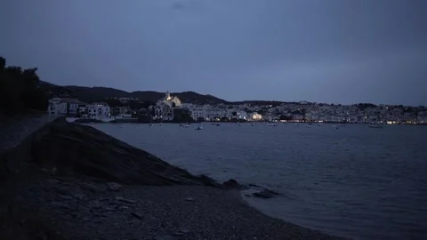 Panoramic View of Cadaques with Soft Lights and Sea at Dusk Stock Footage 242335839