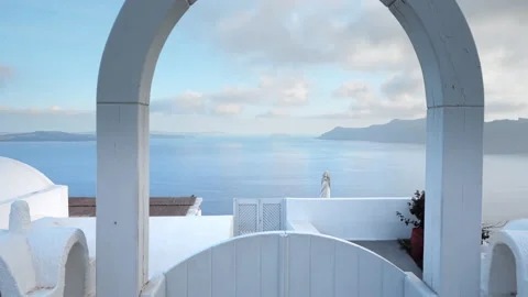 Panoramic view of caldera of Santorini over traditional wooden door Stock Footage 157687820