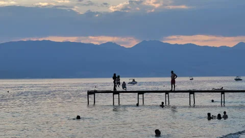 Panoramic view of the calm waters of Lake Ohrid Stock Footage 345262979