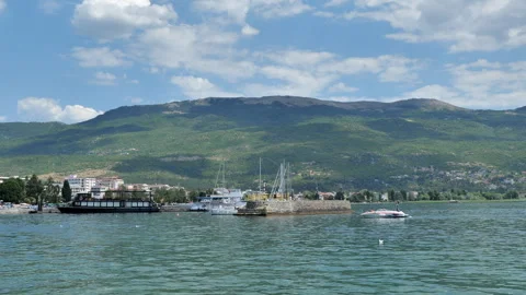 Panoramic view of the calm waters of Lake Ohrid Stock Footage 345264255