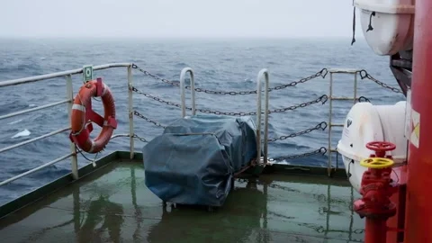 Panoramic view of calm waters of ocean rippling under cloudy sky during peaceful Stock Footage 322546043