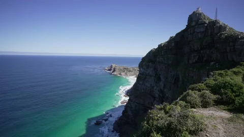 A panoramic view of Cape Point lighthouse with the ocean in the background. Stock Footage 209441389