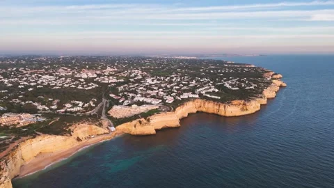 Panoramic view of Carvoeiro and its surroundings at sunset, Portugal Stock Footage 269975979