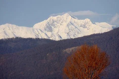 Panoramic view of the Caucasus mountain range from Adler, Russia. Stock Photos