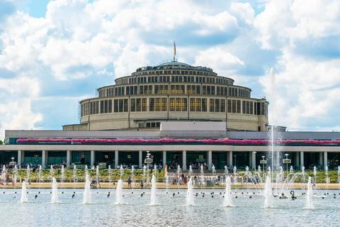 Panoramic view of centennial hall in wroclaw with fountain and blue sky Stock Photos