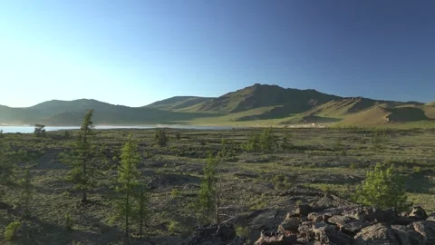 Panoramic view of Central Asia lakeside basalt - Earth Science and Ancient Lava Stock Footage 339702826