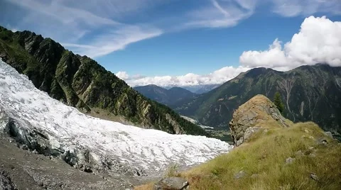 Panoramic view of Chamonix valley and alpine glacier with mountain meadow Stock Footage 52897440