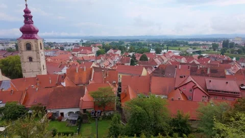 Panoramic view of the city of Ptuj with its red-roofed houses by the Drava River Stock Footage 318793578