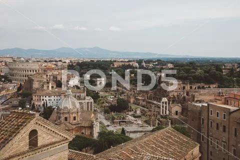 Panoramic view of city Rome with Roman forum and Colosseum from Vittoriano Stock Photos