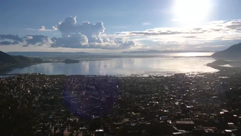 Panoramic View Of The City On The Shore Of A Large Lake In The Morning Stock Footage 196073971