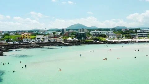 A panoramic view of the clean blue sea and sky of Jeju Island. drone shot. Stock Footage 203879328