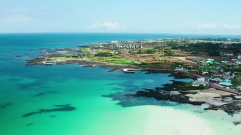 A panoramic view of the clean blue sea of Jeju Island. drone shot. Stock Footage 203879917