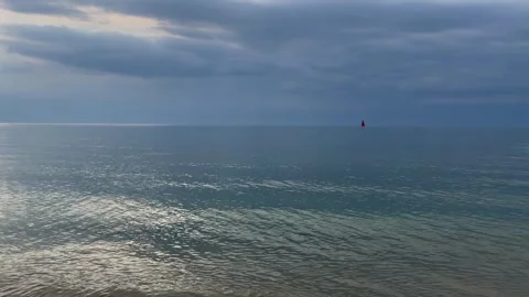 Panoramic view of the clear horizon of the Black Sea and the red sail in the Stock Footage 280367660