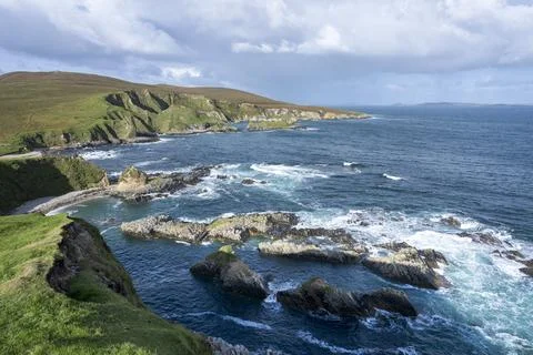 A panoramic view of the Cleggans Cliffs in Ireland. Stock Photos