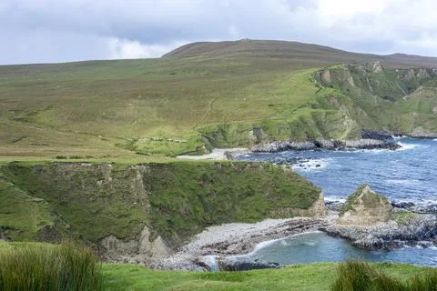 A panoramic view of the Cleggans Cliffs in Ireland. Stock Photos