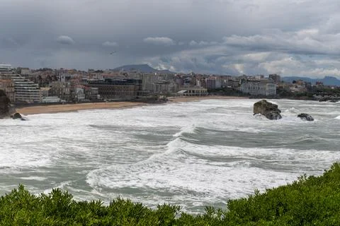 Panoramic view on cliffs, houses, sandy beaches of touristic Biarritz city,.. Stock Photos