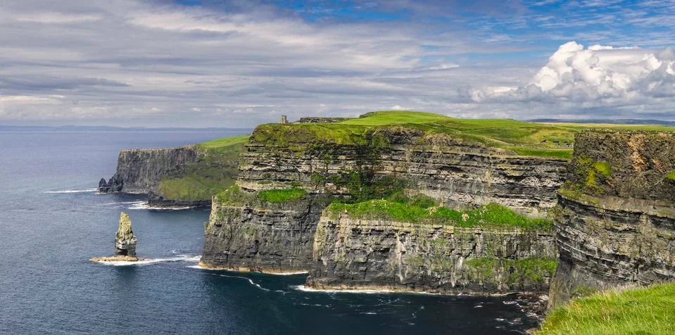 Panoramic view of the Cliffs of Moher on the Irish coast. Stock Photos