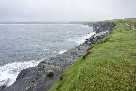 A panoramic view of the cliffs of Mohor in Ireland. Stock Photos