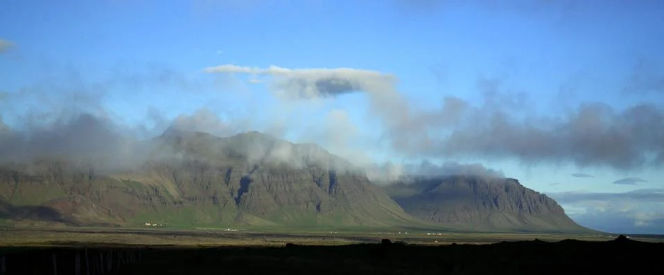 Panoramic view of the clouds over the mountains Stock Photos