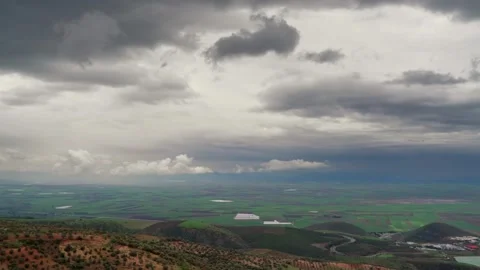 Panoramic view of cloudy sky over flat American plains - Landscape and Dramatic Stock Footage 339396238