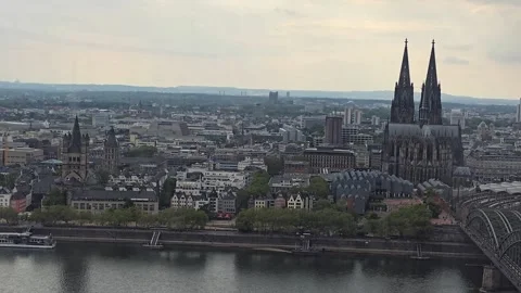Panoramic view of Cologne Cathedral, Rhine river, and cityscape in COLOGNE Stock Footage 345096904
