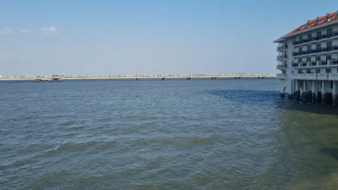 Panoramic view of colonial building, coastal belt 3, highway over the sea in Stock Footage 343788092