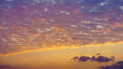 A panoramic view of colourful beatiful evening sky with pink, purple, peach Stock Photos