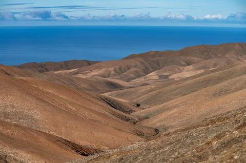Panoramic view on colourful remote basal hills and mountains of Massif of B.. Stock Photos