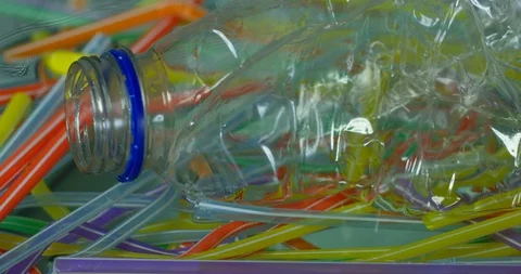 Panoramic View Colourful Straws And Plastic Bottles Floating In Water Stock Footage 113382413