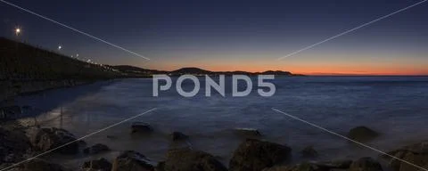 Panoramic view of Colwyn Bay at dusk on the North Wales coast Stock Photos