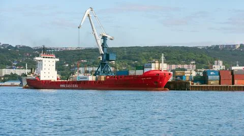 Panoramic view of container ship Sasco Angara Sakhalin Shipping Company at pier Photos