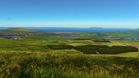 Panoramic View from Coomanaspic Overlooking Lakes, Farmland and Coastline on Video stock 337211402
