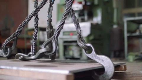 Panoramic view of cords with hooks of ancient winch in workshop Video stock 95858355