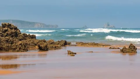 Panoramic view of the Costa Quebrada with huge waves and rock formations in the Stock Photos