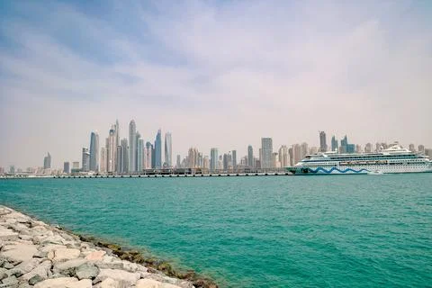 Panoramic view of the cruise ships and skyscrapers at the dubai Stock Photos