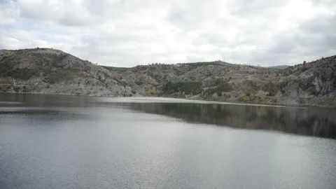 A panoramic view of a dam Stock Footage 225909634