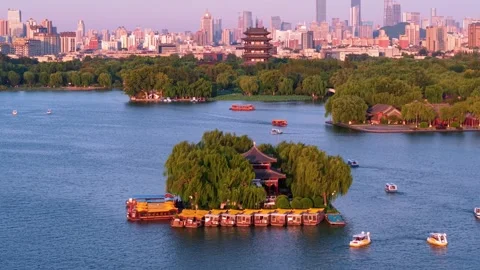 Panoramic View of Daming Lake with Jinan Cityscape at Sunset Stock Footage 331118116