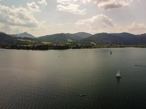 Panoramic view of deep blue Lake Lugano in Switzerland surrounded by mountains Foto stock