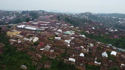 Panoramic view of a densely populated hillside town with various buildings and Stock Footage 317837743